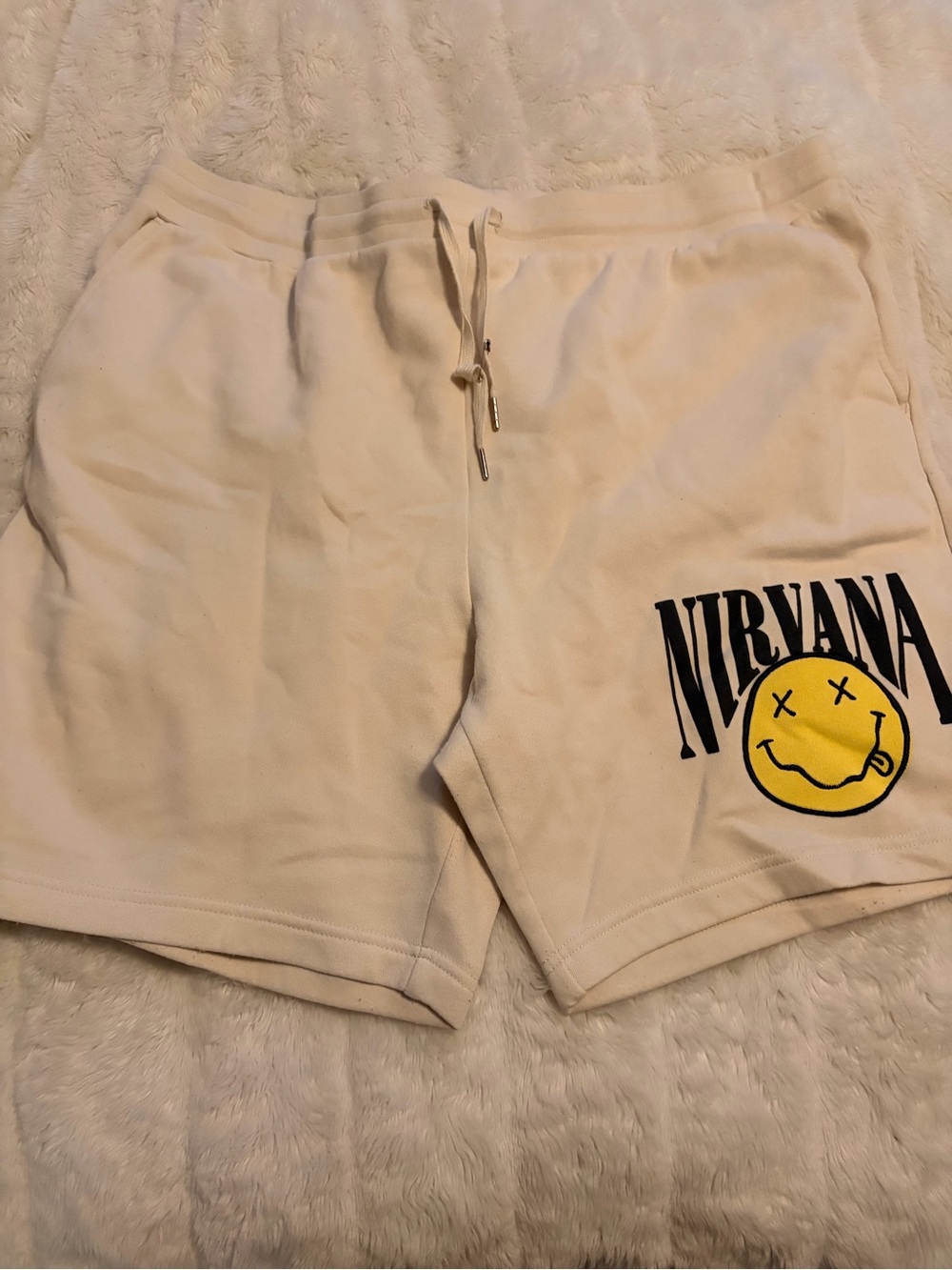 NIRVANA Cream Shorts with Yellow Smiley Graphic